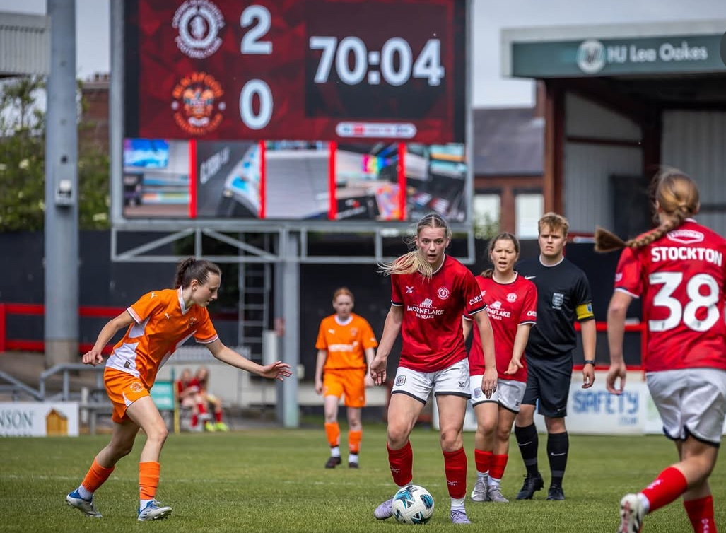 Photo of womens Crewe Alex football players on the pitch during a game